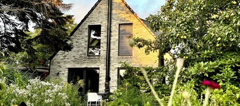 Vacation home for 8 people with natural garden, fireplace & lots of space, near the North Sea