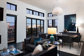 Presidential Penthouse, Balcony, City View | Living area - The 121 Hotel (Nashville)