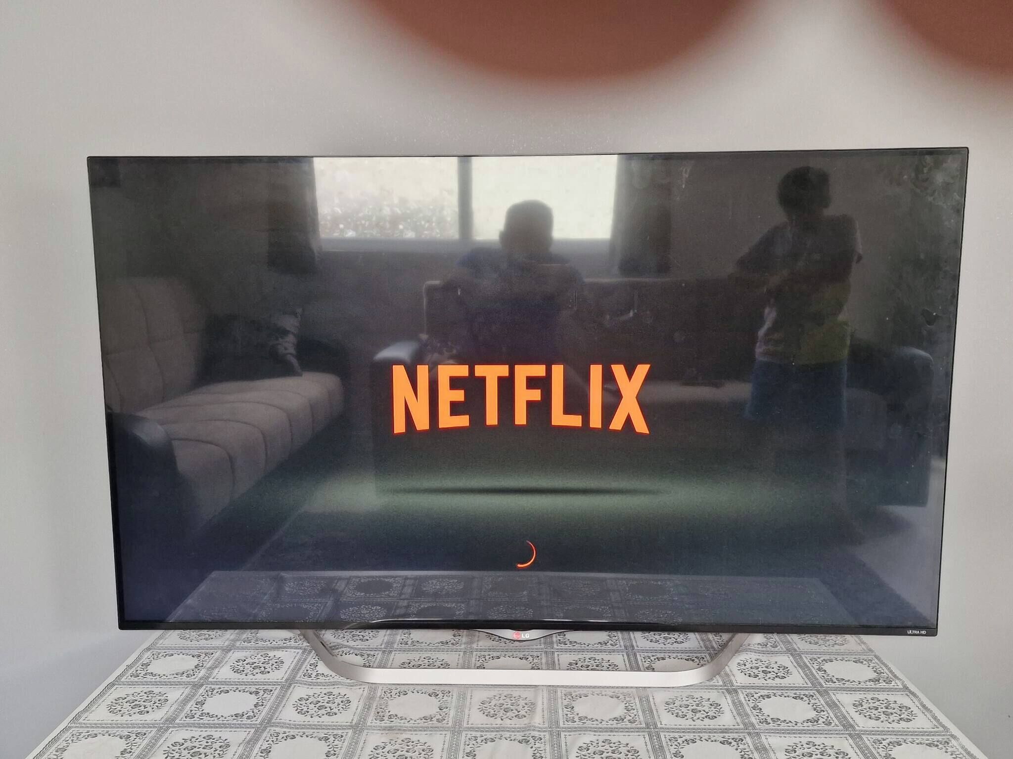 A television with the Netflix logo on the screen.