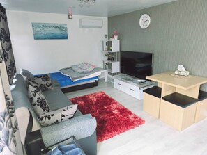 อพาร์ท  เมนท์, 1 ห้องนอน | ห้องนั่งเล่น