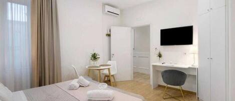 1 habitación, tabla de planchar con plancha, wifi y ropa de cama