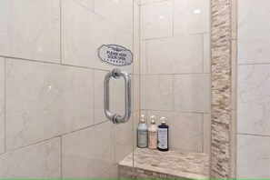 Hair dryer, towels, soap, shampoo