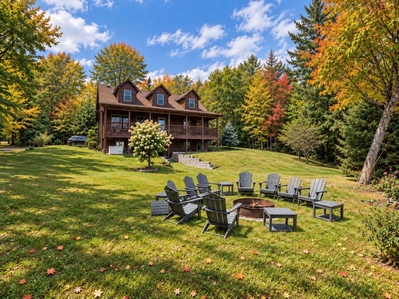 A lodge with a deck and outdoor seating area.