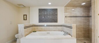 Private pool, 3-bedrooms, 3.5 bathrooms, 2-car garage with EV charger, across from beach access