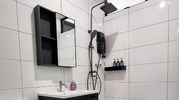 Shower, hair dryer, towels