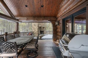 Outdoor dining - Abode at Forest Edge, luxury log home, hot tub (Wilson)
