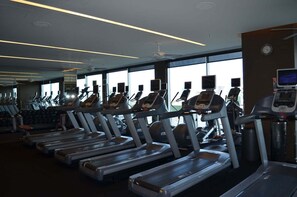 A gym with multiple treadmills, weight machines, and cardio equipment. - Palms Place Studio, Strip Views & Balcony Options (Las Vegas)