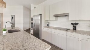 Fridge, dining tables - Landing | Amazing 2BD, Yoga Studio, Gym (Houston)