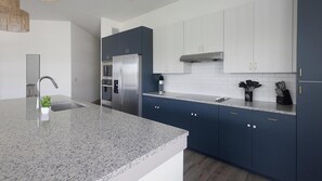 Fridge, dining tables - Landing | Chic 2BD, Courtyard, Gym (Houston)