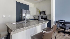 Fridge, dining tables - Landing | Stylish 1BD, Courtyard, Gym (Houston)
