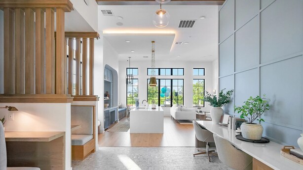 A modern kitchen with a central island, a dining area with a white table and chairs, and a living room with a sofa and a coffee table. - Landing | Modern 1BD, Clubhouse, Gym (Austin)