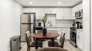 Fridge, dining tables - Landing | Modern 1BD, Clubhouse, Pool (Kissimmee)