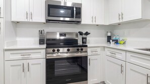 Fridge, dining tables - Landing | Stylish 1BD, Gym, Pool (Kissimmee)