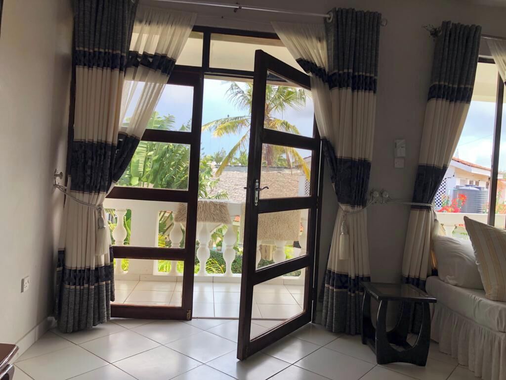 Family Apartment | Living area | 24-inch Smart TV with digital channels