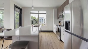 Fridge, dining tables - Landing | Incredible 2BD, Clubhouse, Game Room (Atlanta)