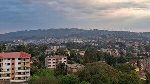 A cityscape with buildings and hills in the background. - Heri Heights Ngong (Ngong)