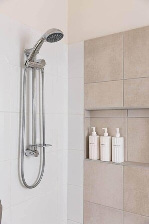 Hair dryer, towels, soap, shampoo