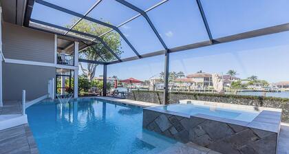 Waterfront Luxury: Spacious 7-Bed, Heated Pool and Spa Retreat