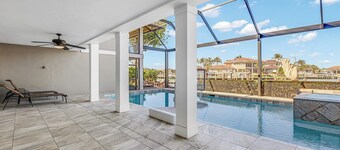 Waterfront Luxury: Spacious 7-Bed, Heated Pool and Spa Retreat