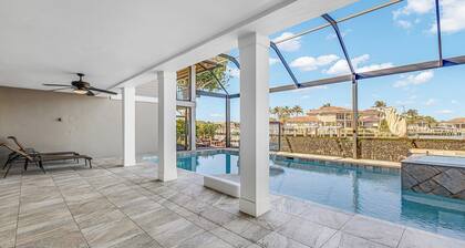 Waterfront Luxury: Spacious 7-Bed, Heated Pool and Spa Retreat