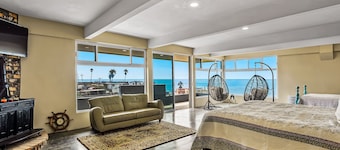 Tropical retreat with ocean views - steps from the sand with alfresco dining