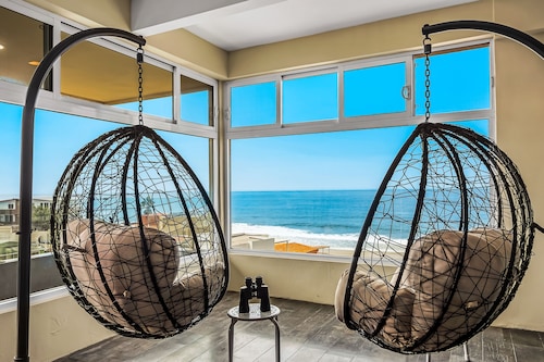 Tropical retreat with ocean views - steps from the sand with alfresco dining