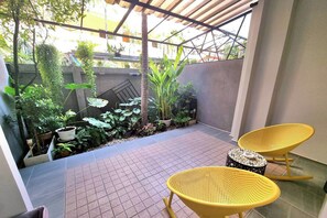 Kahden hengen deluxe-huone, näköala puutarhaan | Näkymä huoneesta