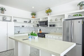 Fridge, microwave, oven, stovetop - Dog-friendly home with heated pool, hot tub, partial ocean views, & balcony (Rosarito)