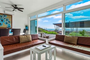 Living area - Beach-view dog-friendly villa with private patio, outdoor pool, streaming, AC (Rosarito)