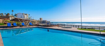 Dog-friendly ocean-view villa with patio, outdoor pool, streaming, partial AC