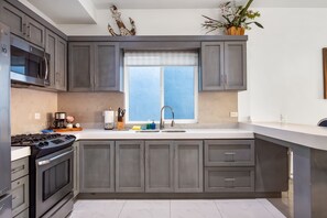 Private kitchen - Dog-friendly ocean-view villa with patio, outdoor pool, streaming, partial AC (Rosarito)