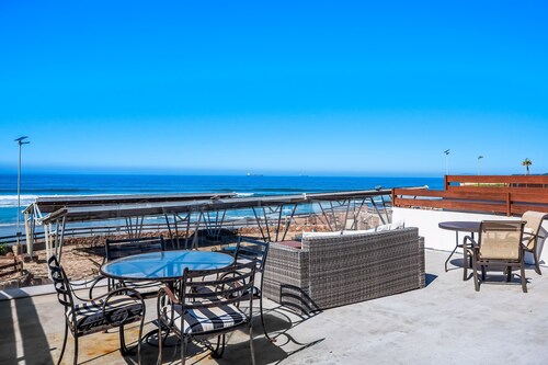 Airy, beach-view dog-friendly villa with patio, outdoor pool, streaming, AC