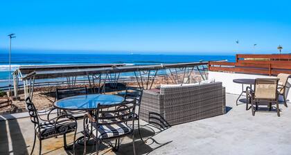 Airy, beach-view dog-friendly villa with patio, outdoor pool, streaming, AC