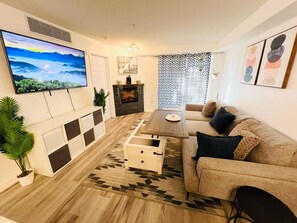 Apartment, 2 Bedrooms, Accessible, Fireplace | Living room - Modern Comfort in Edmonton's Heart, 2 Bedroom Apartment (Edmonton)