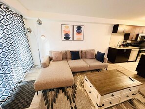 Apartment, 2 Bedrooms, Accessible, Fireplace | Living area - Modern Comfort in Edmonton's Heart, 2 Bedroom Apartment (Edmonton)