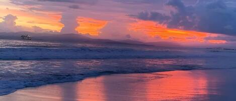 On the beach, sun-loungers, beach towels
