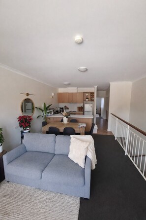 Living area - Tranquil luxury  1-bedroom apartment - partial canal views charming Halls Head (Halls Head)