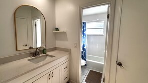 Shower, hair dryer, towels, soap - Furnished 2BR/2BA Home w/ Fenced Yard • Near L3Harris, Hospital, & Beach (Melbourne)