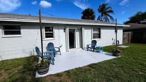 Terrace/patio - Furnished 2BR/2BA Home w/ Fenced Yard • Near L3Harris, Hospital, & Beach (Melbourne)