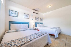 Room - 2 Bedroom Delightful second-floor apartment with modern amenities , WiFi & Pool (Playas del Coco)