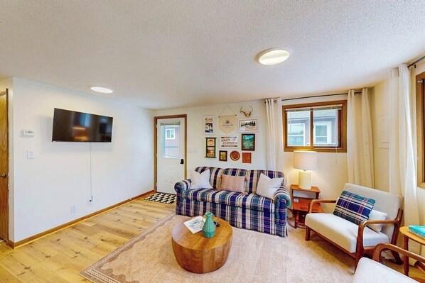 Living area - Pickerel Lake cabin w/ kayaks, dock, patio, grill & direct access to trails! (Eagle River)