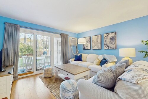 Modern fairway condo with open layout, private patio, AC & washer/dryer