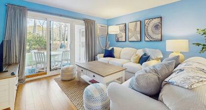 Modern fairway condo with open layout, private patio, AC & washer/dryer