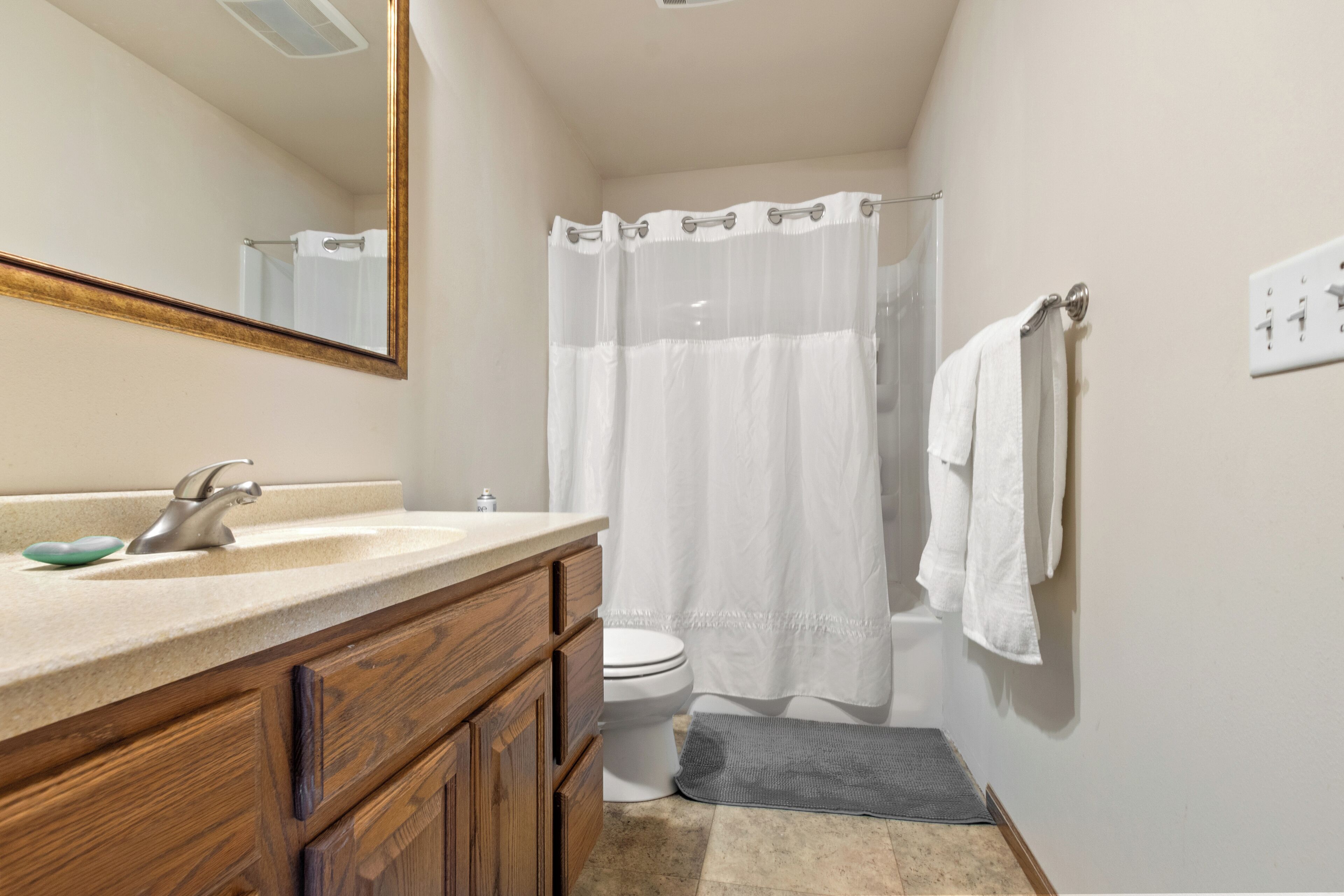 Shower, towels, soap, toilet paper