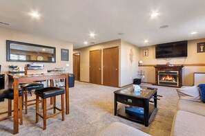 Smart TV, fireplace, books