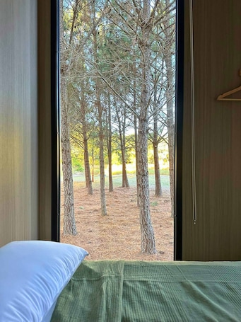 Bed sheets. The Nest at Novena Pines by Tiny Away