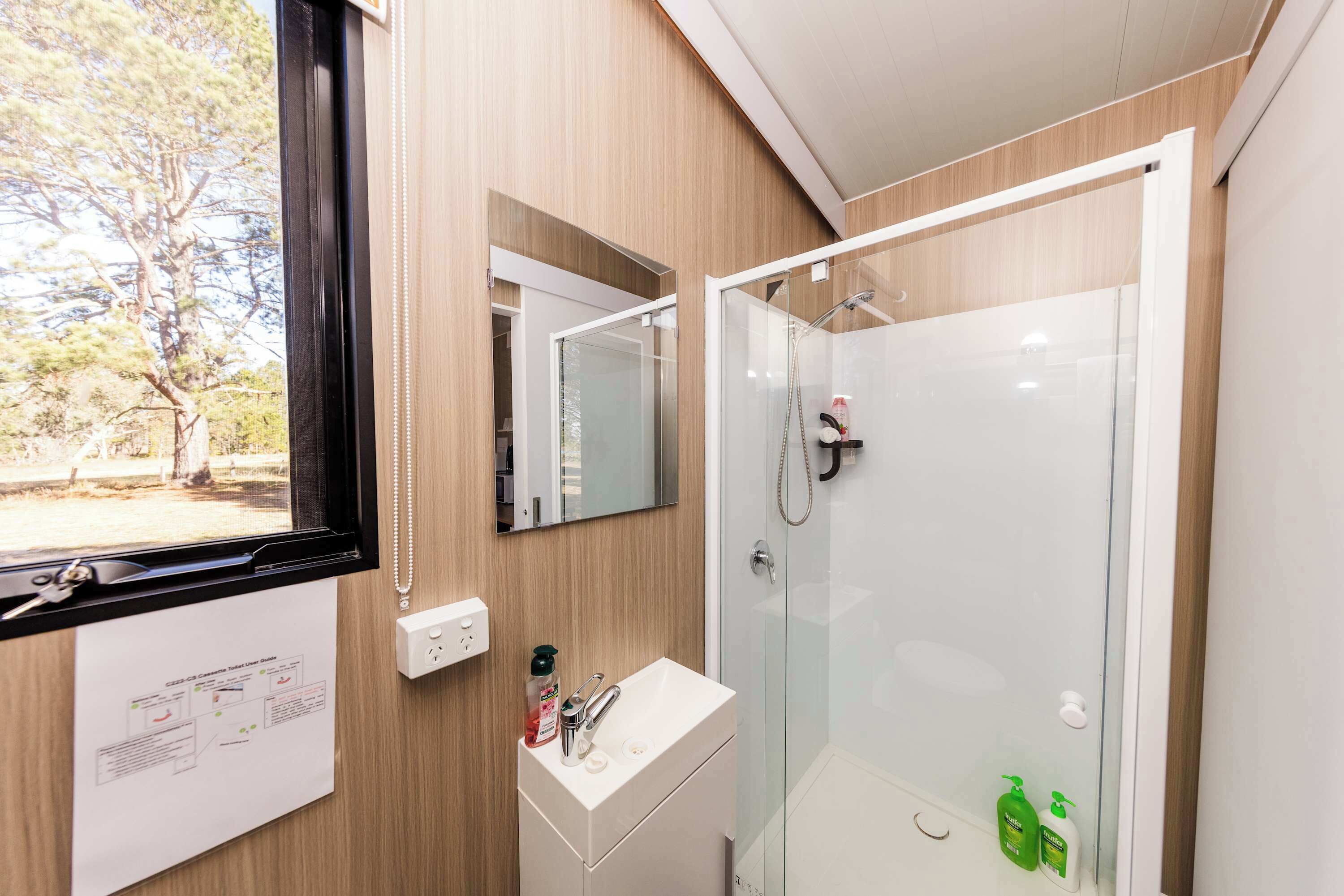 Shower, hair dryer, towels, shampoo
