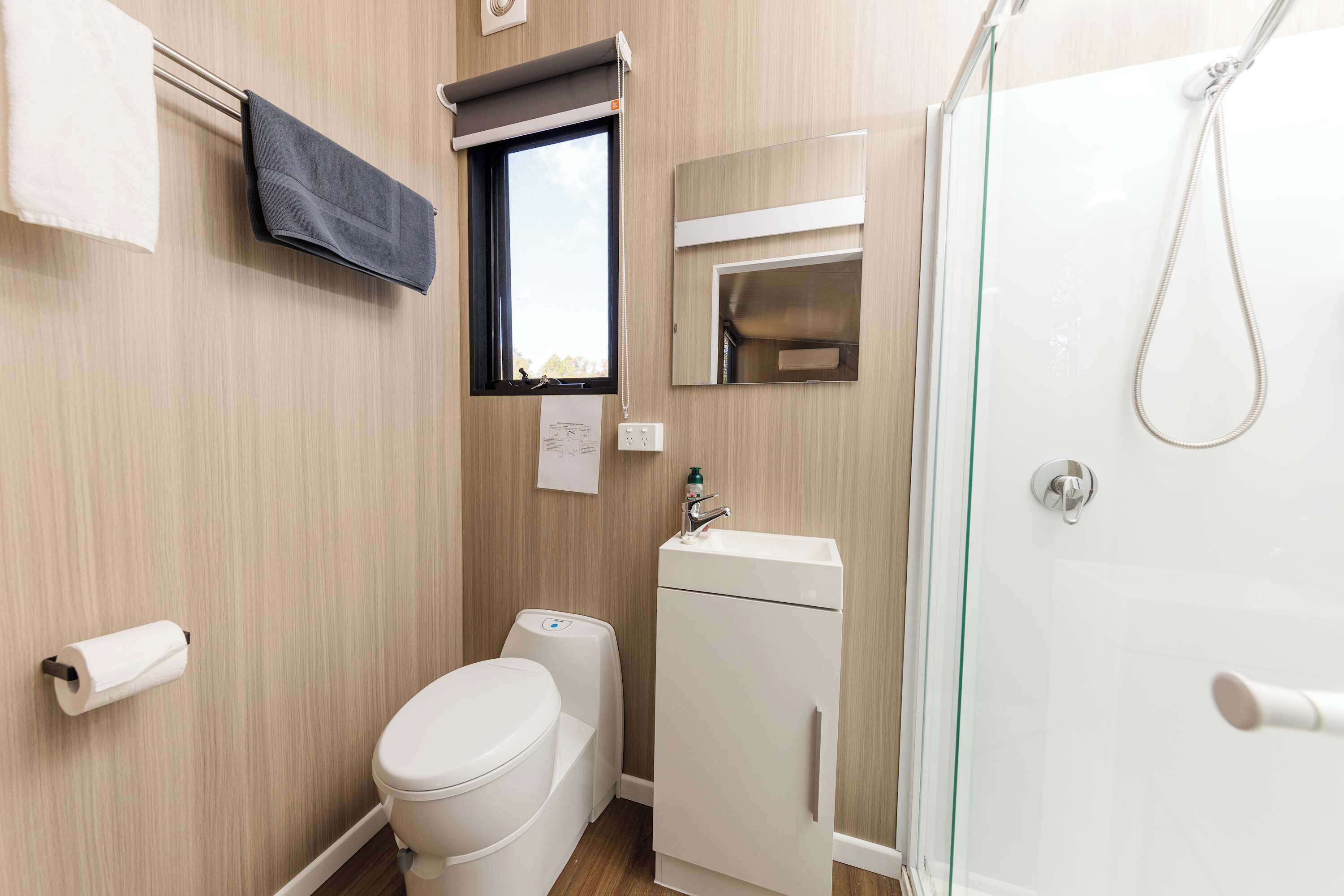 Shower, hair dryer, towels, shampoo