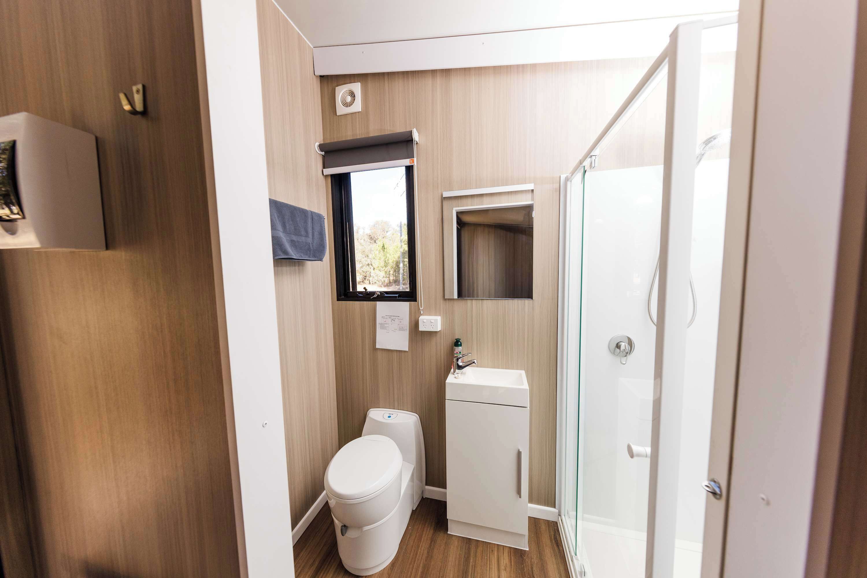Shower, hair dryer, towels, shampoo