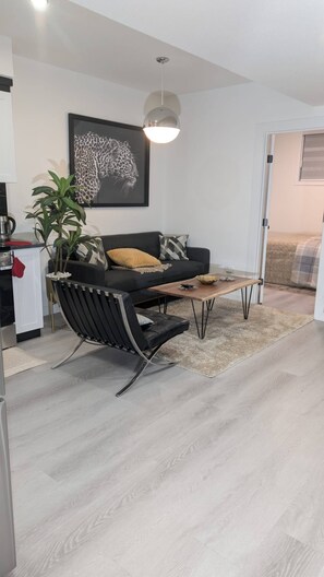 Apartment, 2 Bedrooms, Balcony | Living area | Books - The Loft Moden Rental (Calgary)